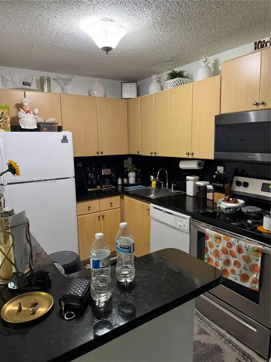 2 bedroom 1 bath for sale at 7155 NW 179th St # 112, Hialeah FL 33015
