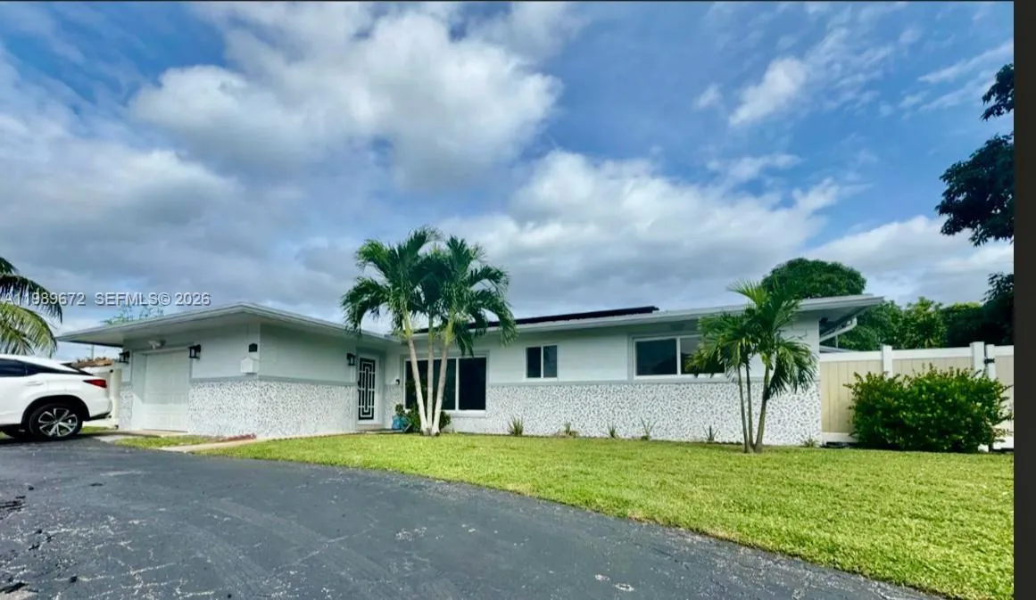 4 bedroom 2 bath for sale at 4861 NW 7th St, Plantation FL 33317