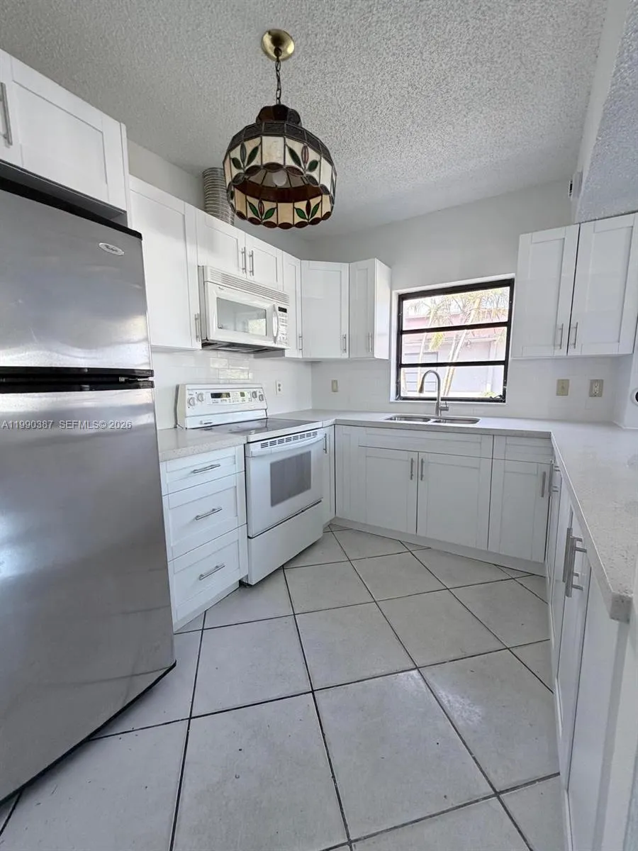 450 NW 43rd Pl, Miami FL 33126