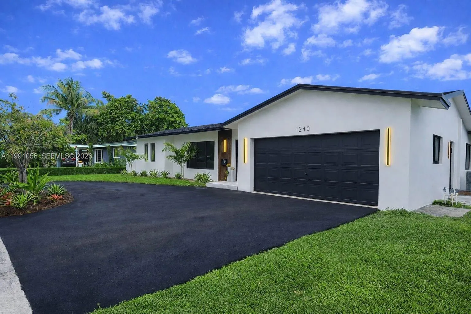 4 bedroom 2 bath for sale at 1240 S Cypress Rd, Pompano Beach FL 33060