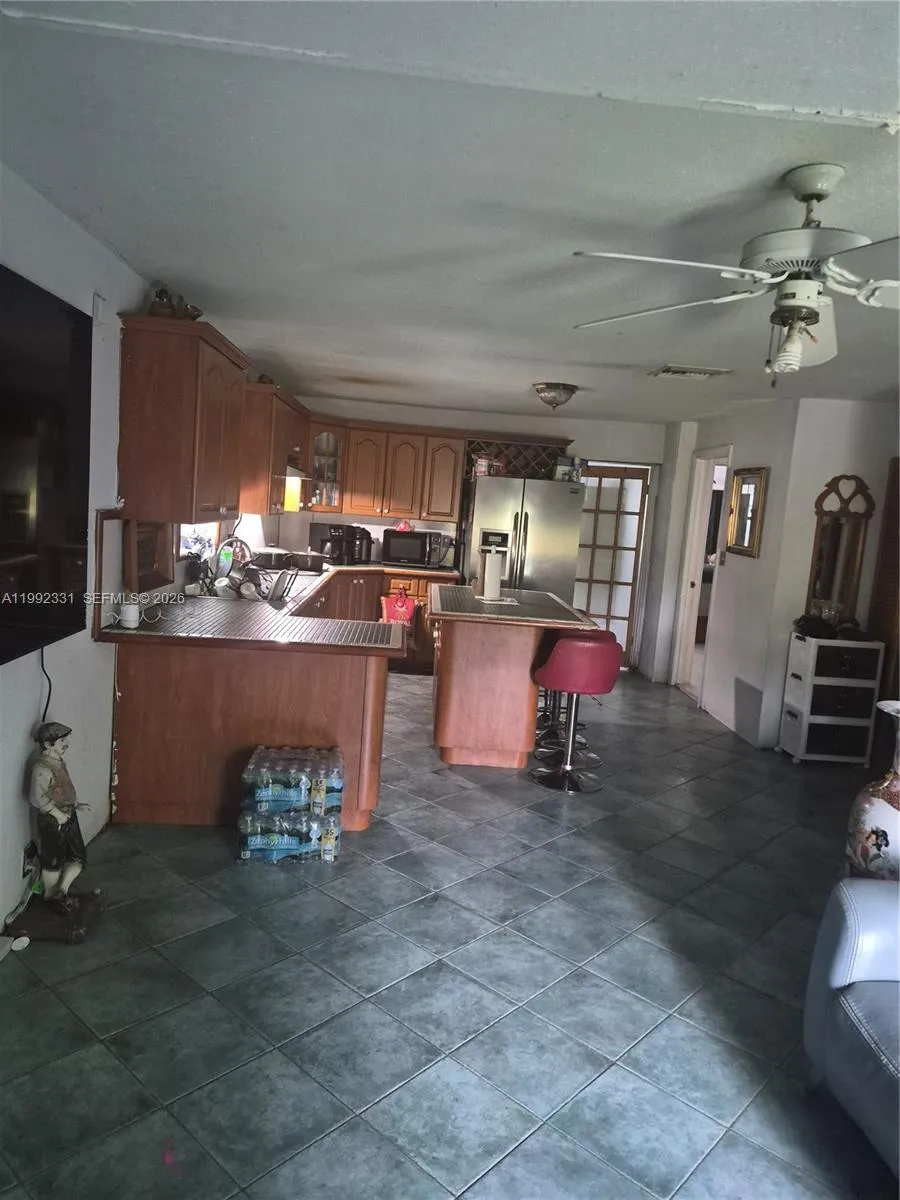 3 bedroom 2 bath for sale at 399 NW 98th St, Miami FL 33150