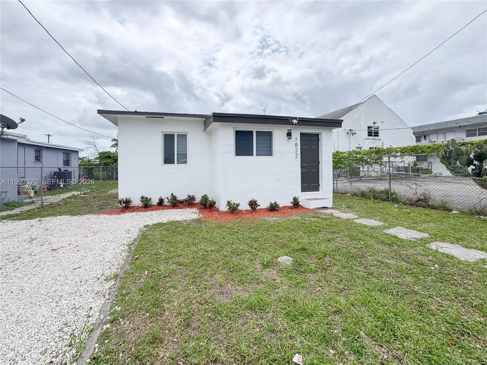 3 bedroom 2 bath for sale at 1822 NW 66th St, Miami FL 33147