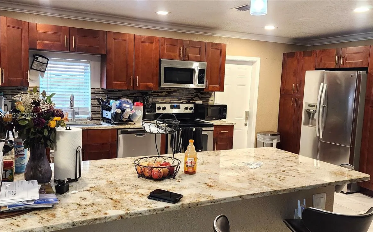 7707 SW 8th St, North Lauderdale FL 33068