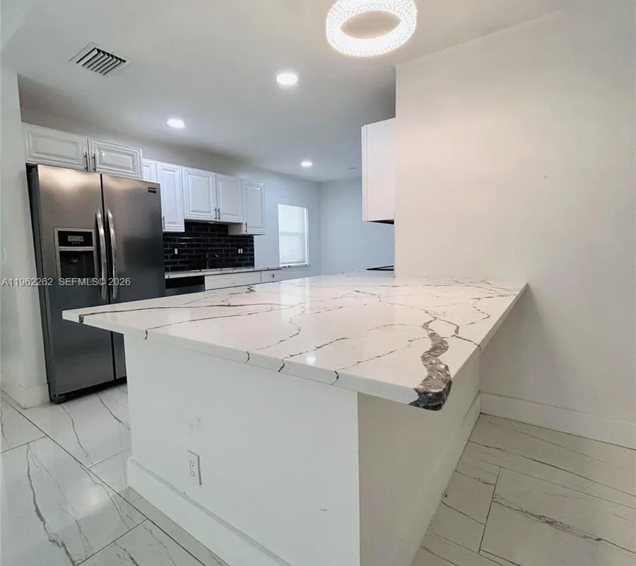 2560 Calamondin Cir, Coconut Creek FL 33063