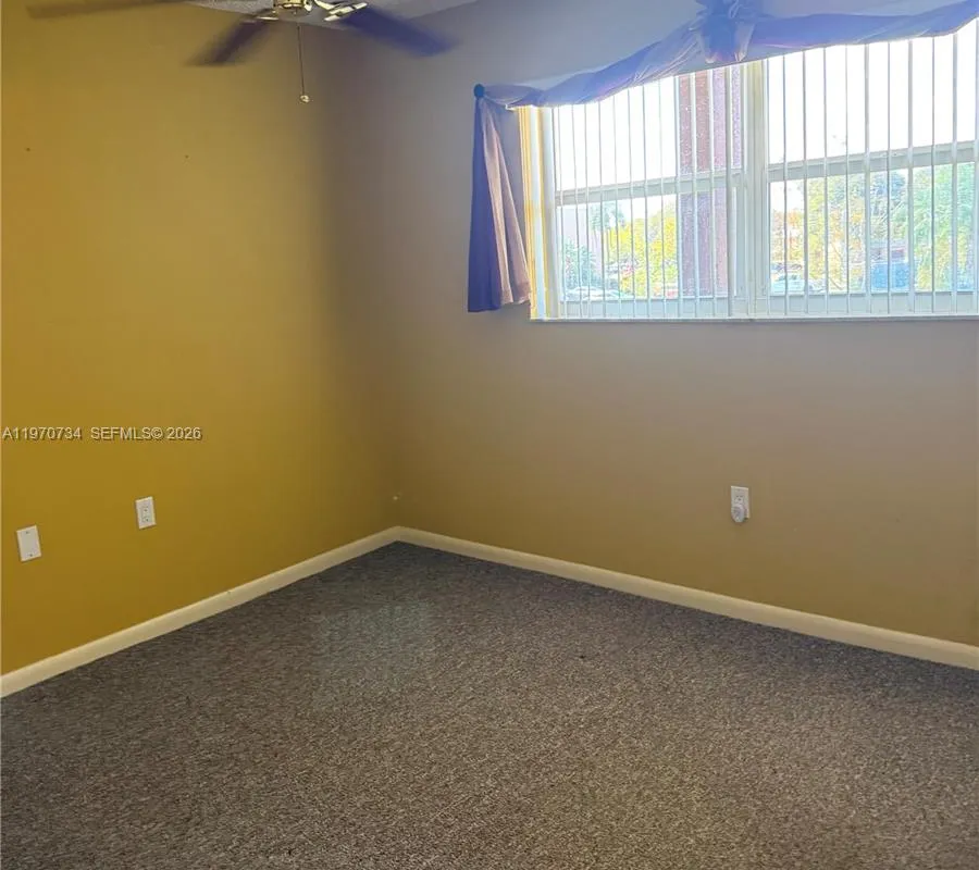 2721 N Pine Island Rd # 202, Sunrise FL 33322