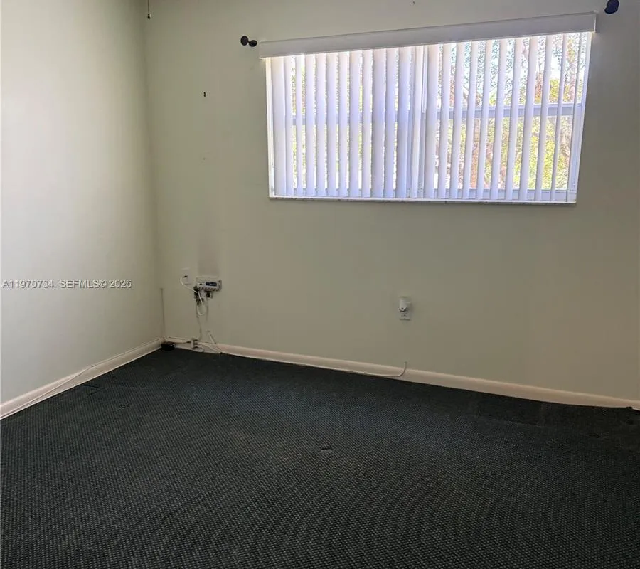 2721 N Pine Island Rd # 202, Sunrise FL 33322