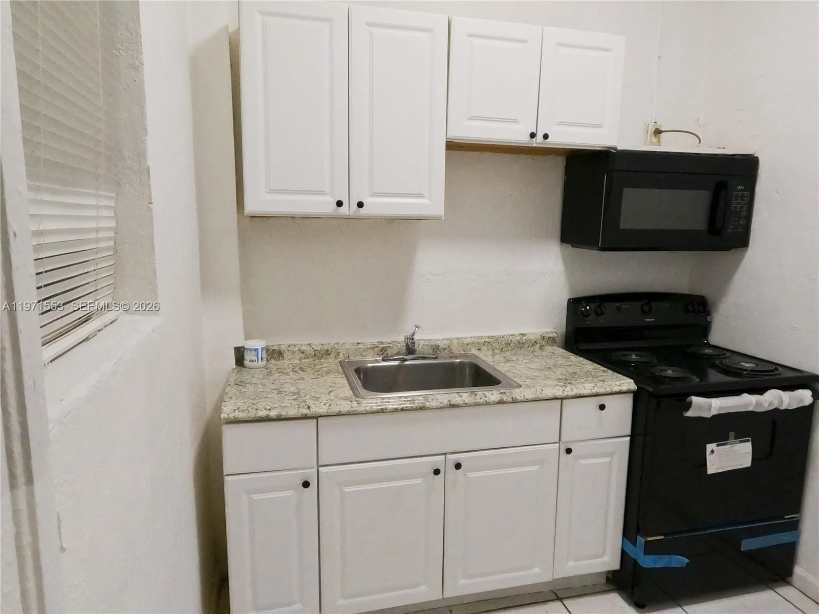 1120 NW 64th St Side, Miami FL 33150