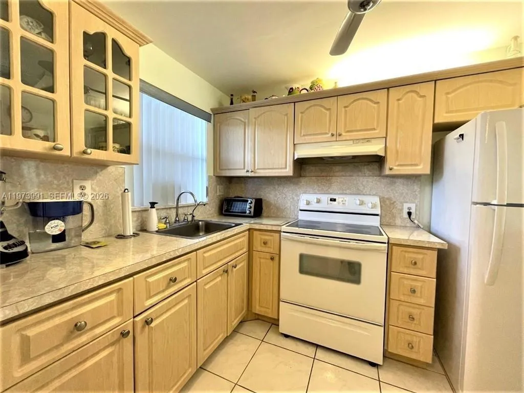 9900 Sunrise Lakes Blvd # 210, Sunrise FL 33322