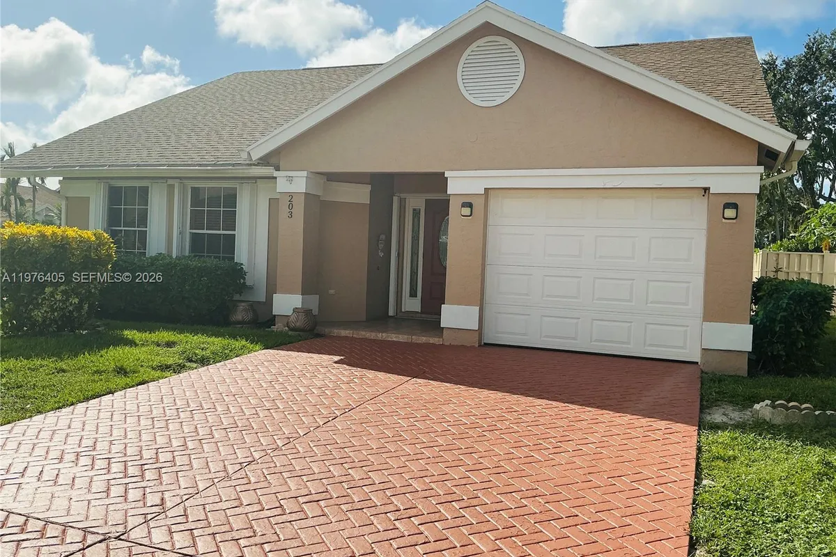 203 N Moccasin Trl N, Jupiter FL 33458