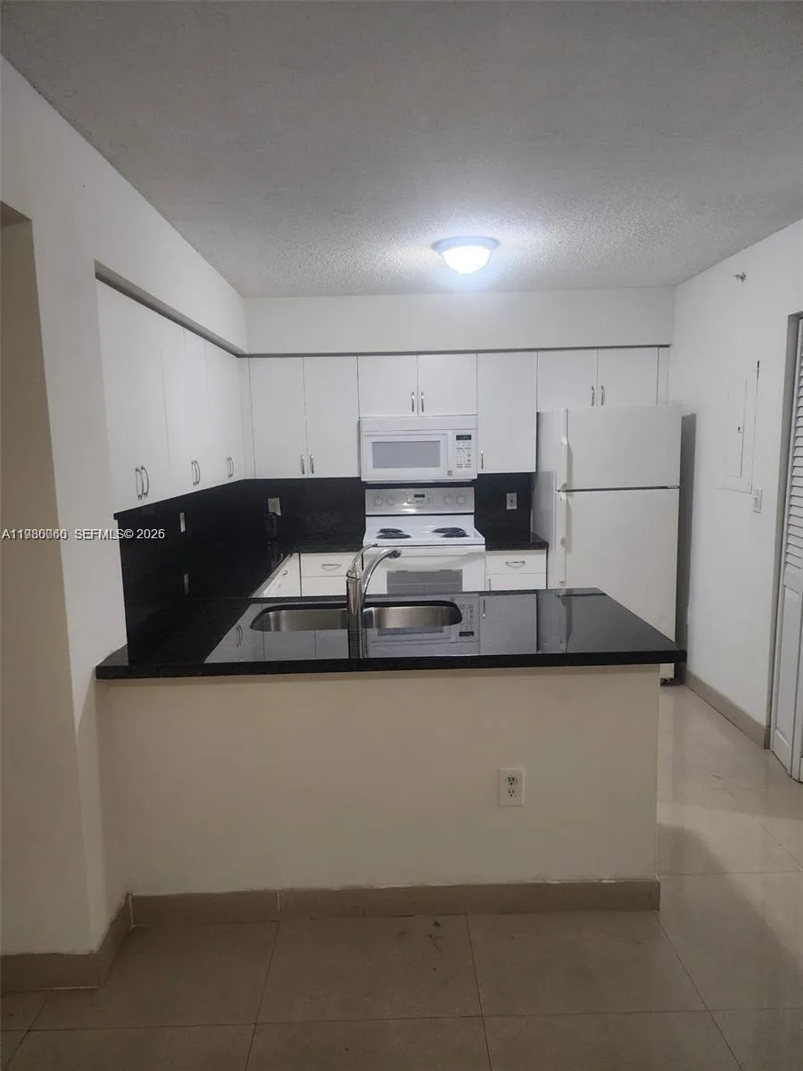 1 bedroom 1 bath for sale at 4560 NW 107th Ave # 12, Doral FL 33178