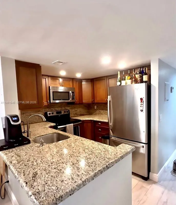 73 Deer Creek # 105, Deerfield Beach FL 33442