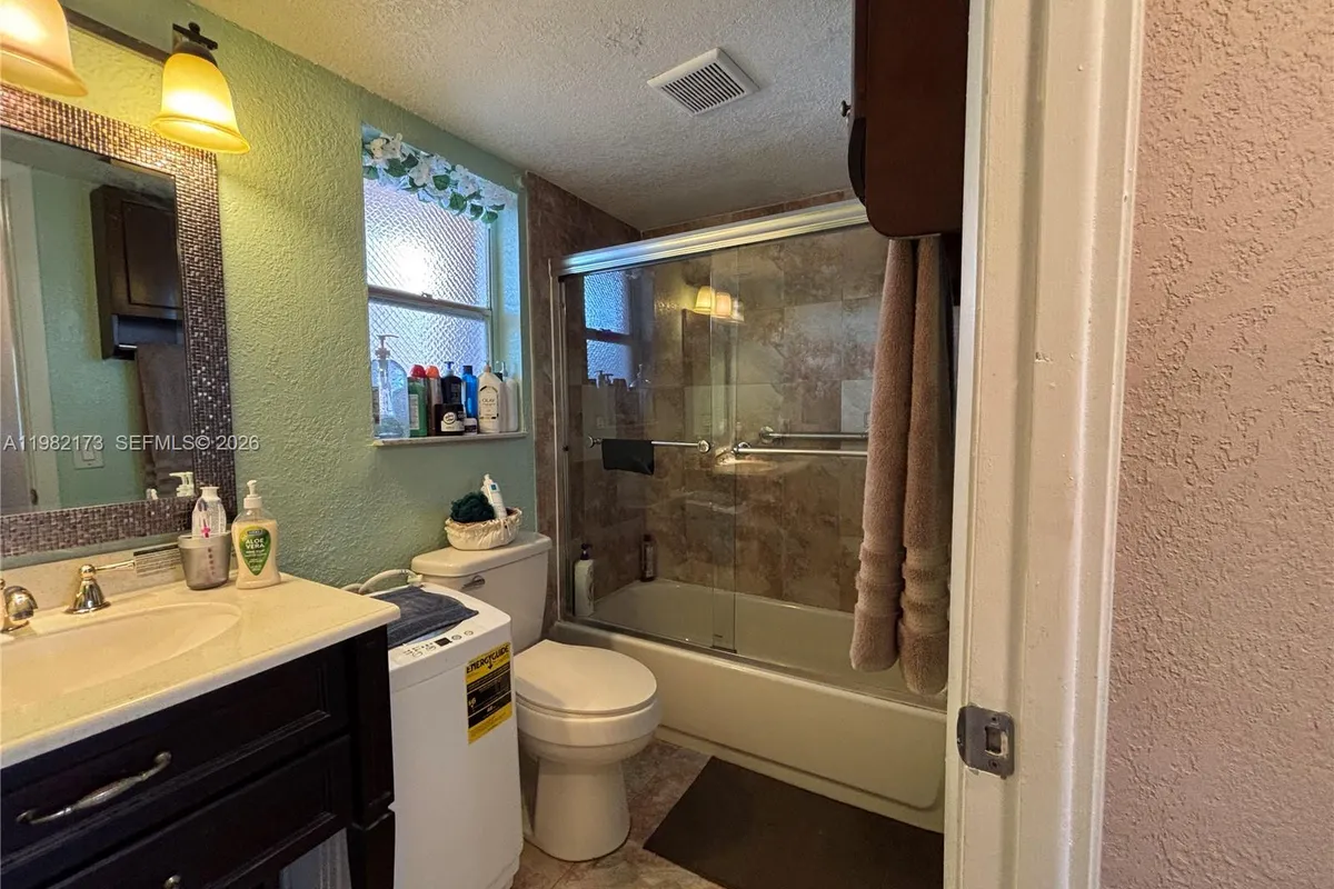 9900 Sunrise Lakes Blvd # 107, Sunrise FL 33322