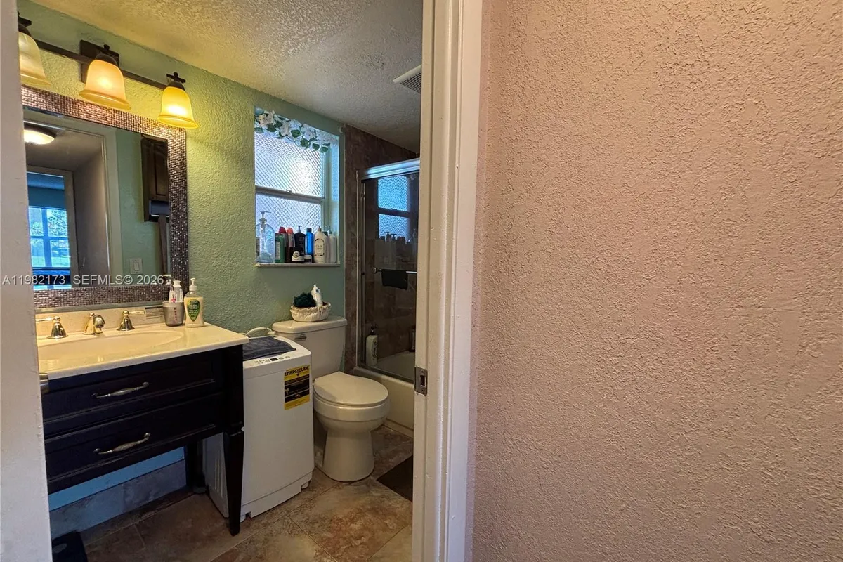 9900 Sunrise Lakes Blvd # 107, Sunrise FL 33322