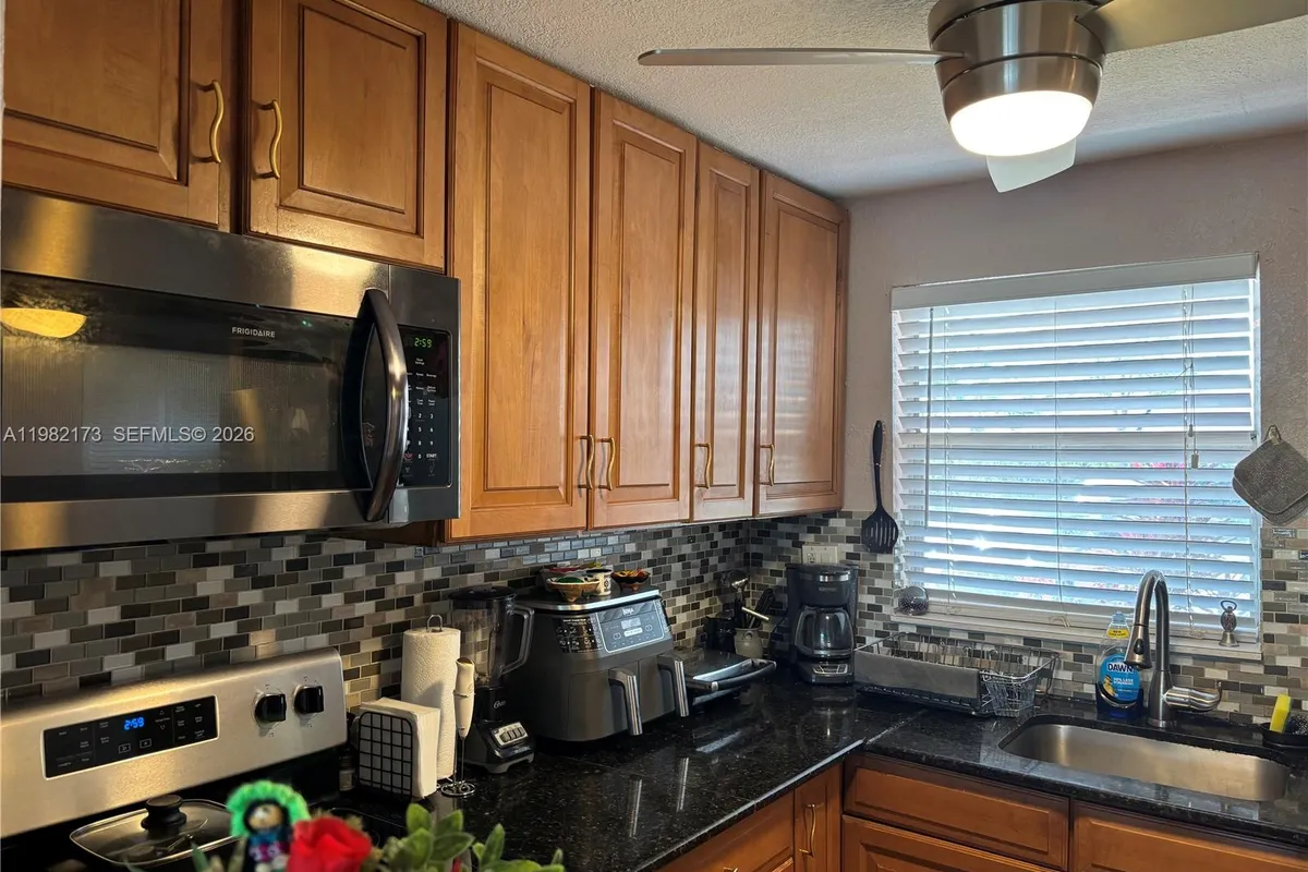 9900 Sunrise Lakes Blvd # 107, Sunrise FL 33322