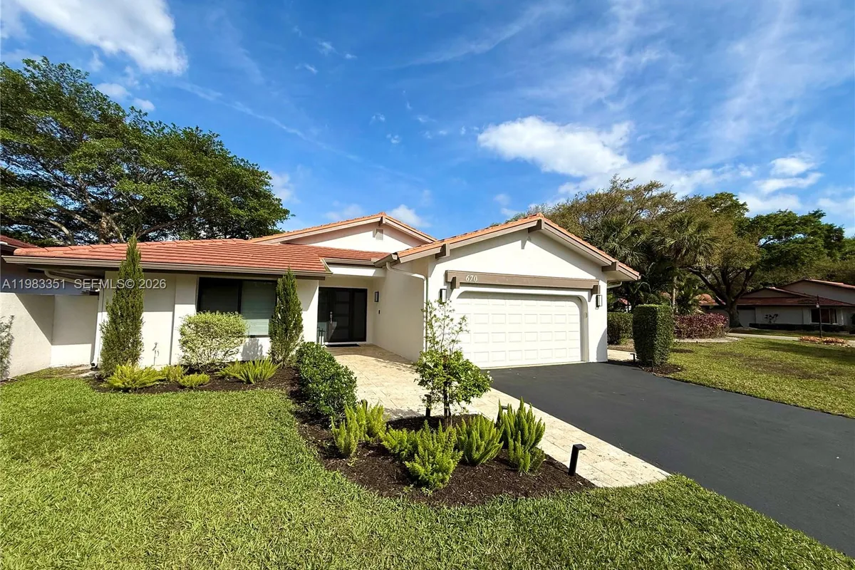 670 Deer Creek Hollows Cir, Deerfield Beach FL 33442