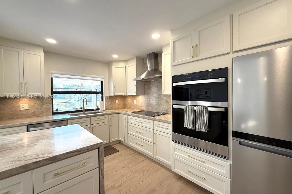 670 Deer Creek Hollows Cir, Deerfield Beach FL 33442