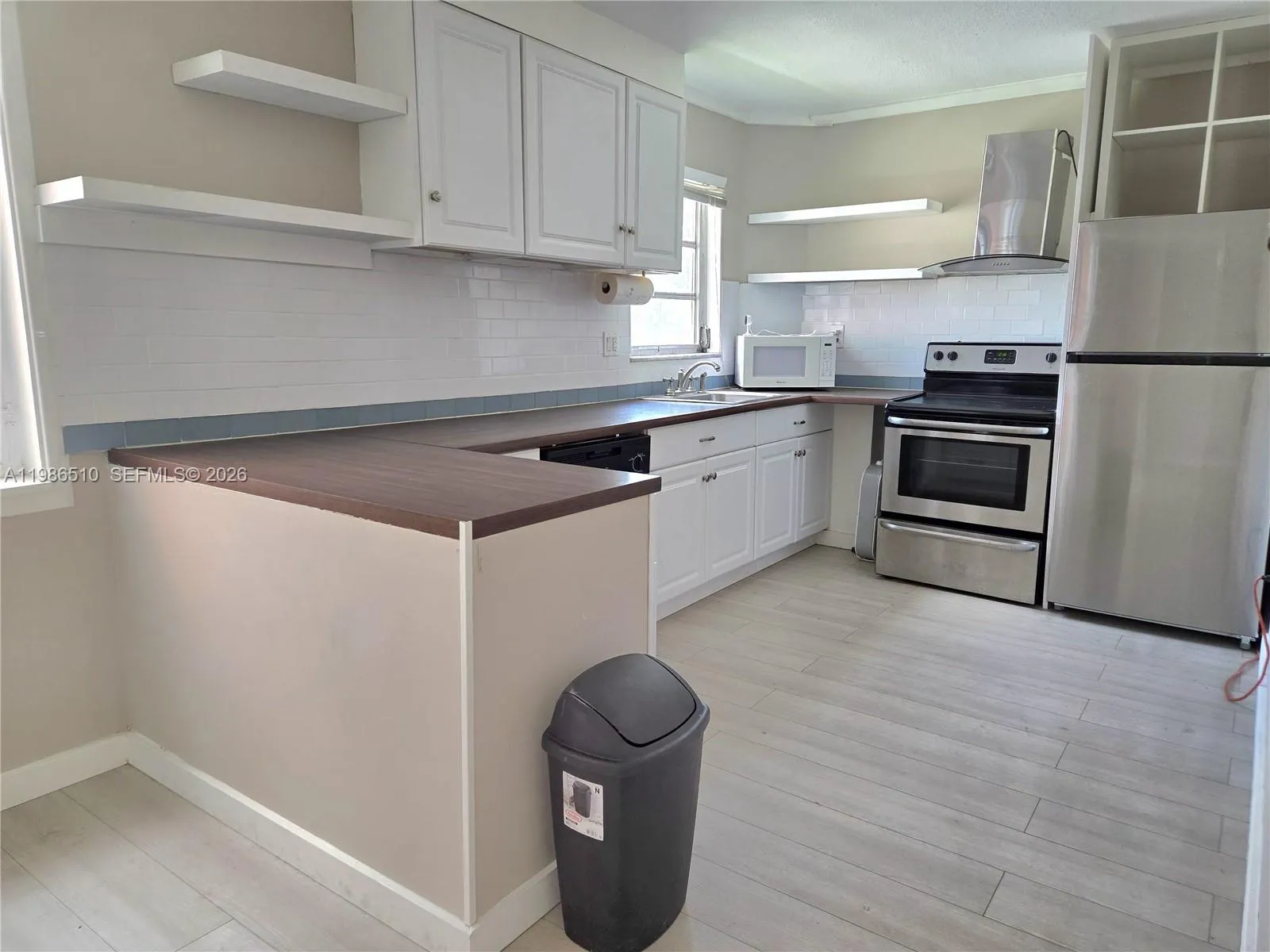 1700 NE 191st St # 100, Miami FL 33179